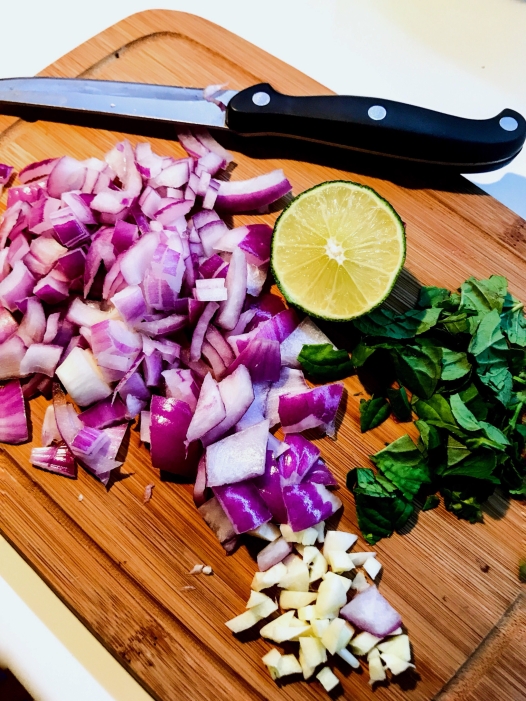 onions, mint, lime, chopping board